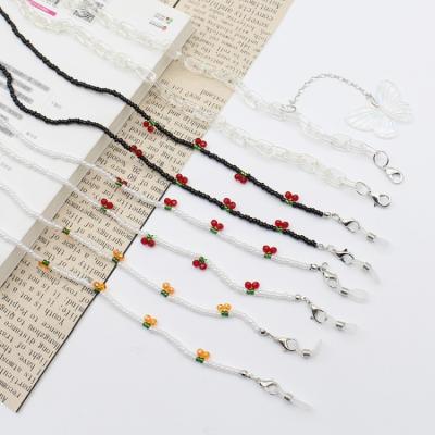 China NEW Design Cherry and Pearl Chain Butterfly Glasses Chain Glasses Strap TRENDY Crystal Glasses Chain for sale