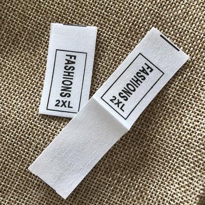 China Washable cotton or satin center fold garment label sleeves folding label product decoration label custom label for sale