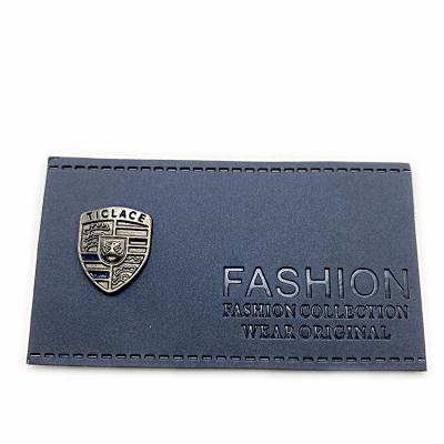 China High Quality Sustainable Metal Casting Label Factory Custom Logo Denim Embossed Leather Label For Clothing for sale