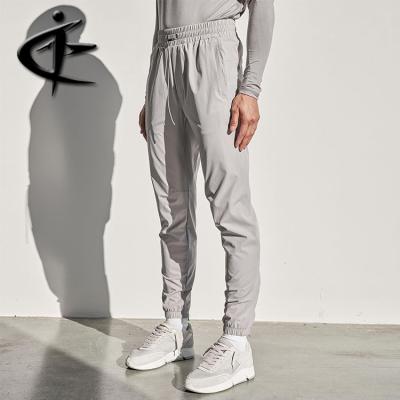 China Fashion Waterproof Hot Selling Tracksuit Sport Zipper Cargo Base Back Hidden Nylon Pants for sale