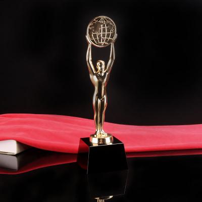 China Europe Gold Color Metal Man Crystal Trophy For Replica Oscar Shooting Award for sale