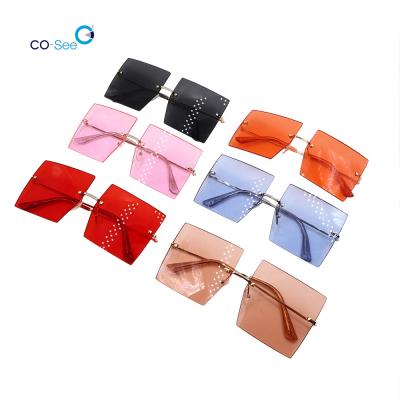 China Fashion sunglasses 2020 fashionable square luxury metal fashion brand women's colorful rimless sunglasses for sale