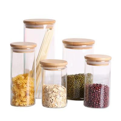 China Borosilicate Glass Stocked Storage Jars Storage Container Bamboo Lid Sealed Kitchen Food Storage Jars for sale