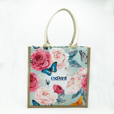 China Elegant Handled 420gsm Jute Shopping Bag With Colorful Flowers Printing for sale