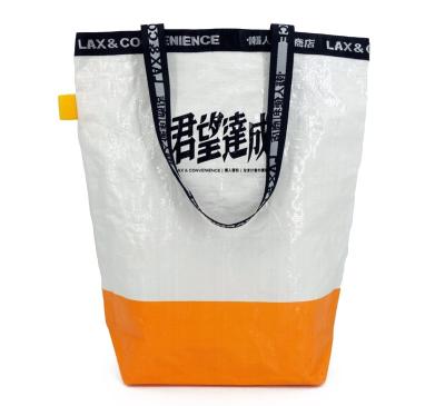 China High Quality Waterproof Glossy Handled Lamination PP Woven Shopping Bag To Carry Bag With Nice Printing for sale