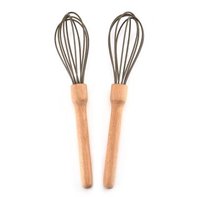 China Sustainable Silicone Kitchen Tools Egg Beater With Wooden Handle for sale