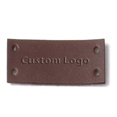 China Custom viable wholesale fashion pu/genuine leather label with embossed logo for high quality jeans for sale