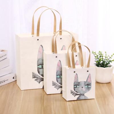 China Factory Direct Sale Recycled Materials Factory Direct Sale Cutting Cat Pattern Handle Craft Paper Bags For Clothes for sale