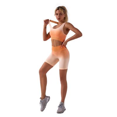 China New Breathable Fashionable Orange Seamless Yoga Shorts Yoga Set Bra Quick Dry Fitness Workout 2 Piece Women Yoga Set for sale