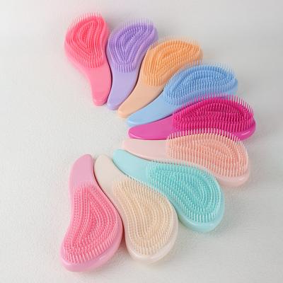 China Cheap Wholesale Portable Soft Tooth Baoli Massage Comb Smooth Hair No Knot Head Comb Plastic Wet And Dry Hair Comb for sale