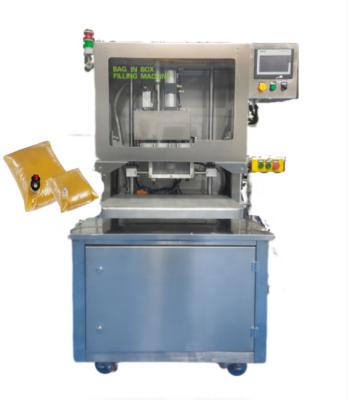 China High Quality Automatic APPAREL Wine Juice Water Bib Filler Equipment / Bag In Box Filling Machine for sale