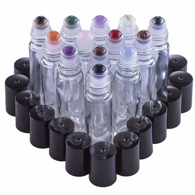 China Personal Care Gemstone Roller Bottle for Essential Oils Beautiful Glass Roller Bottles with Precious Gemstones and Crystals Tops for sale