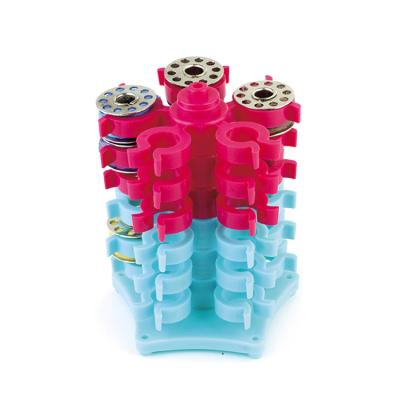 China Silicone Color Notion Spin Sewing Bobbins Dominate Bobbin Saver for sale