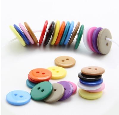 China Sustainable Fashion Custom Logo 23mm 2 Hole Plastic Resin Four Hole Sewing Shirt Buttons For Clothes for sale