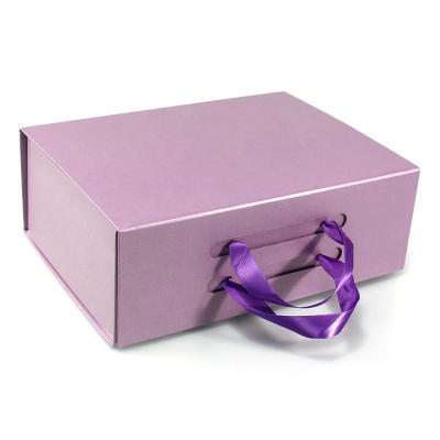 China Recyclable Factory custom logo rigid cardboard folding skincare set gift paper box clothing gift box packaging for sale