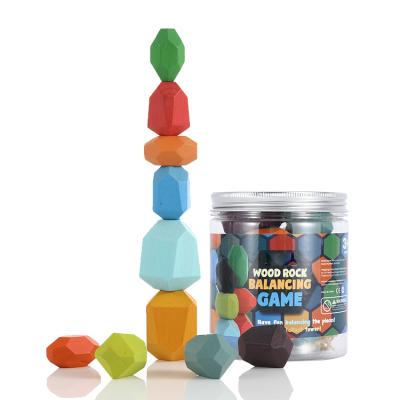 China Eco-friendly Material Rainbow Colored Wooden Stacking Blocks Set 10 Pcs Wooden Balancing Stacking Rocks With A Storage Jar for sale