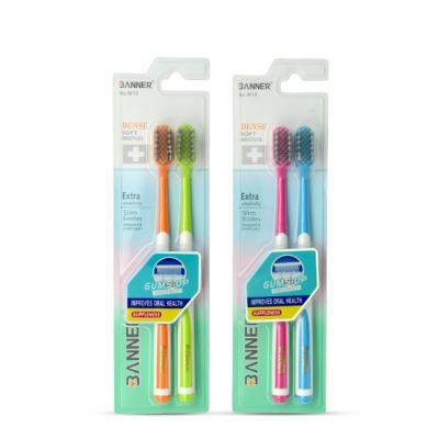 China Disposable BANNER 2 pieces of transparent adult manual toothbrush with spiral bristles for sale