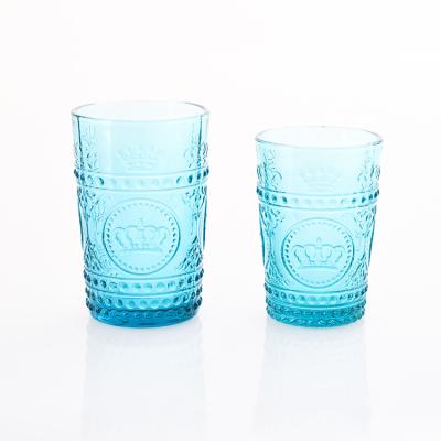 China Customize Factory Wholesale Cheap Pressed Tumbler Engraved Embossed Pattern Colored Glass Wine Glass for sale