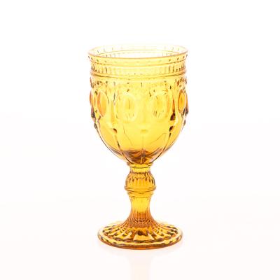 China Wholesale cheap pressed pattern embossed custom wine glass transport factory mirror wine glass cup for sale