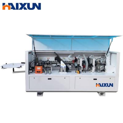 China New Design CNC Edgebander MDF Plywood Veneer Production Design Automatic Banding Edging Machine Woodworking for sale