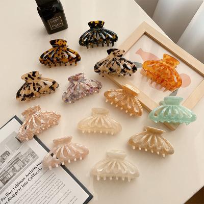 China Hair Claw Clips  DIANXIANG 2022 Korean acetic acid caramel milk tea color hollow hair accessories large acetate hair claw clips for sale