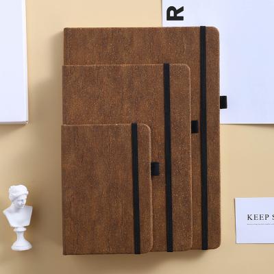 China Custom A5 Hardcover Printed Agenda Planner Printed Leather Bound Journal Notebook with Elastic Band for sale