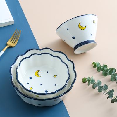 China Sustainable Underglazed Color Moon Stars Decorative Blue And White Ceramic Fruit Salad Bowl Set for sale