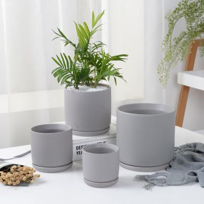 China Modern Hot Selling Modern Colorful Ceramic Matte Flower Pots With Drainage Hole And Saucer for sale