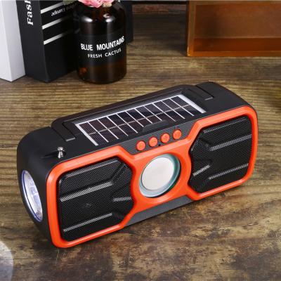 China Wireless charger for mobile phone amazon hot sale bluetooth speaker with solar and wireless bluetooth speakers with solar power FM radio TF card function for sale