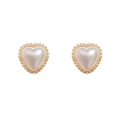 China CLASSIC Trendy Korean Heart Pearl Stud Earrings With Zircon Designs Jewelry For Woman Gift Party for sale