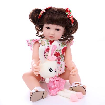 China ZIYIUI Soft Toy 22 Inch Full Body Silicone Girl Doll Reborn Cloth Doll Fairy Dolls For Girls for sale