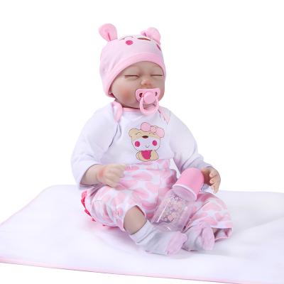 China Soft Toy 22 Inch Closing Eyes Dress Girl Reborn Silicone Babi Doll Christmas Toys Reborn Doll Girl for sale