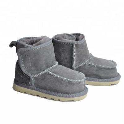 China Real Sheepskin Children Snow Boy Warm Woolen Shoes Children Boot Soft Warm Cozy Winter Booties Stick On Boots for sale