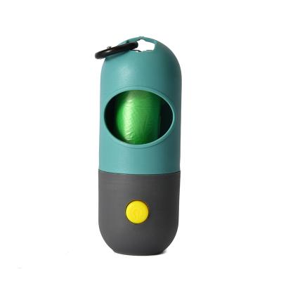 China New Sustainable Capsule Shape Portable LED Pet Poop Bag Holder Poop Bag Dispenser for sale