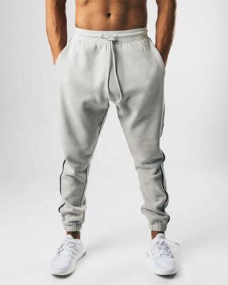 China Anti-Wrinkle Best Quality Low MOQ Fitness Mens Joggers Sweatpants Jogging Sweatpants Elastic Sports Pants Custom Made for sale