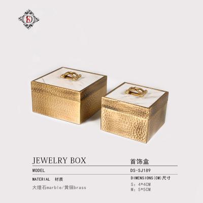 China Fashion Brass Marble Modern Minimalist Creative Leather Glass Jewelry Box Room Dresser Cloakroom Storage Box Model Decoration for sale