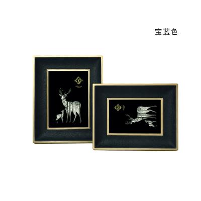 China Modern luxury simple leather bedroom decoration picture frame photo light room decoration model table brass+leather living room 6/7 inch photo frame for sale