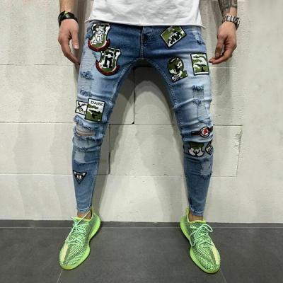 China Z0925 Streetwear New Viable Mens Camouflage Patch Ripped Skinny Jeans Fashion Hole Male Stretch Casual Denim Pants for sale