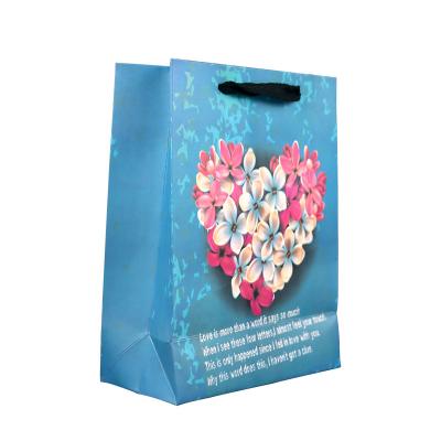 China Biodegradable Custom Logo White Gift Bag Pink Shopping Bag Black Paper Bag With Ribbon Closure for sale