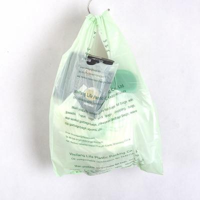 China Printing Biodegradable T-Shirt Shopping Packaging Plastic Bags With Handle For Supermarket for sale