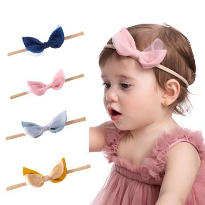 China Cute bow European and American double layer lace solid color Amazon style nylon hair band with baby elastic headdress for taking pictures for sale