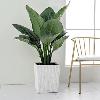 China Contemporary Rattan Flower Planter Self Watering Pot Plastic Plant Pot for sale