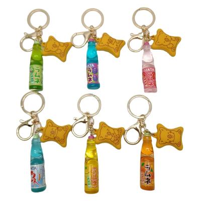 China Environmentally Friendly Hot Selling Different Simulation 3D Soda Bottle Taste Bottle Miniature Opens Soft Drink Key Chain Charm for sale