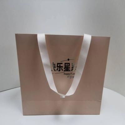 China Recyclable Custom luxury pink clothing store retail packaging gift tote boutique shopping paper bags with logo for sale