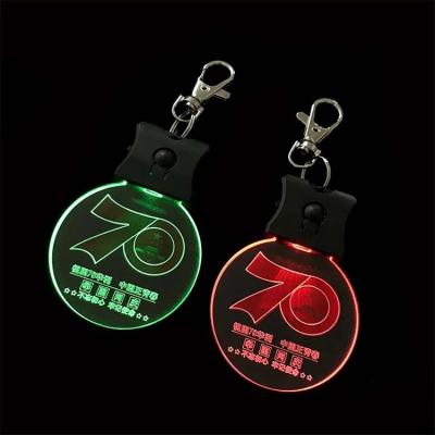 China Custom Acrylic +ABS+metal Shape LOGO Acrylic LED Flashing Light Up Laser Round Christmas Festival Key Chain for sale