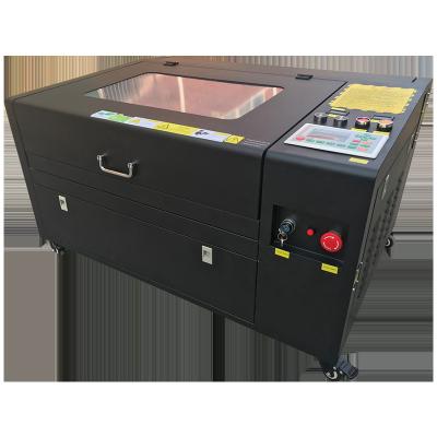 China Nonmetal CO2 Laser Cutting Machine Water Cooled CO2 Laser Wood Engraving Machine for sale