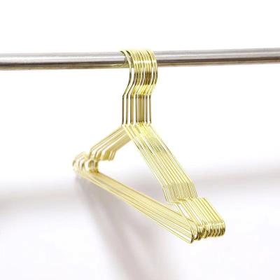 China Wholesale cheap factory price Nordic light luxury style clothes hanger in gold and rose gold color, anti slip metal hanger clothes for sale