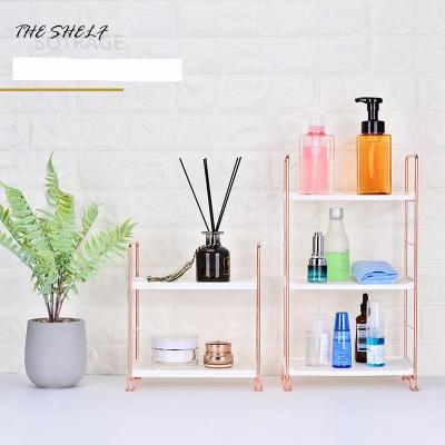 China Nordic Light Luxury Metal Shelf Rose Gold Desktop Style Multifunctional Bathroom Storage Shelf for sale