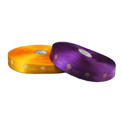 China Delicate Hot Stamping Recyled Logo Yellow Purple Satin Ribbon For Wedding Packaging for sale