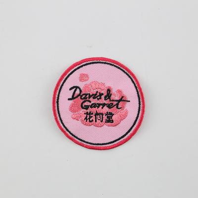 China 3D Round School Uniform Pink Embroidery Label for sale